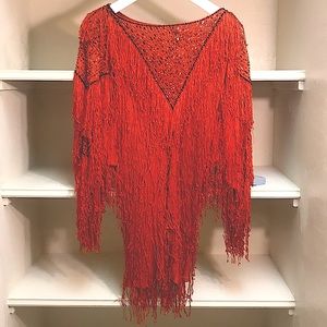 A fabulous mini dress, a top or a cloak?